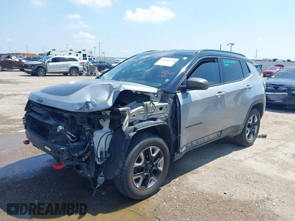 2018 Jeep Compass Trailhawk with VIN 3C4NJDDB2JT198784, listed as a IAAI auction lot 42405539 with 121,553 mi miles and . Bid and sale history available at DreamBid. Image 6.