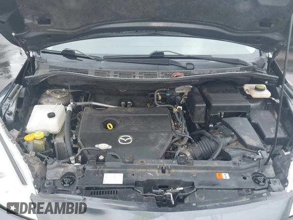 2015 Mazda 5 Sport with VIN JM1CW2BL3F0188052, listed as a IAAI auction lot 40777036 with 69,405 mi miles. Bid and sale history available at carsss.com. Image 10.