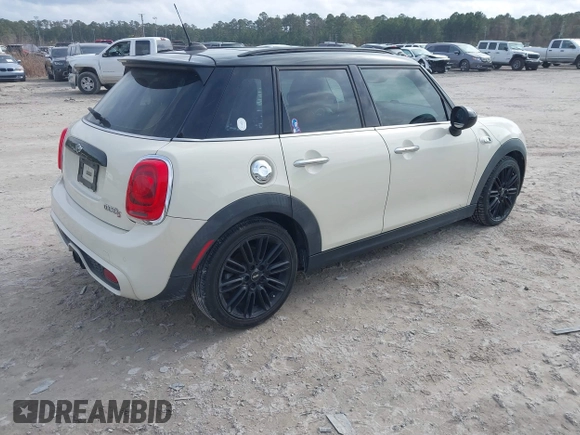 2017 MINI Hardtop 4 Door Cooper S z VIN WMWXU3C54H2D32602, wystawiony jako IAAI lot #41458333 z przebiegiem 124 235 mil mil oraz . Historia ofert i sprzedaży dostępna na DreamBid. Obrazek 4.