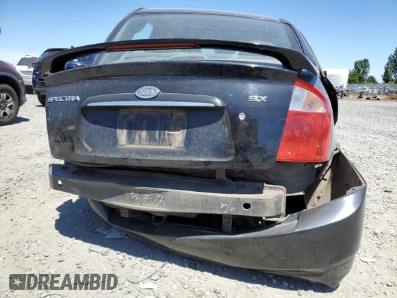 2005 Kia Spectra LX with VIN KNAFE121255156796, listed as a Copart auction lot 58595684 with 197,792 mi miles and Salvage Title. Bid and sale history available at carsss.com. Image 6.