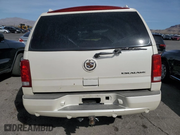 2004 Cadillac Escalade z VIN 1GYEC63T44R185526, wystawiony jako Copart lot #50969335 z przebiegiem 129 386 mil mil oraz Szkoda całkowita • Salvage title. Historia ofert i sprzedaży dostępna na DreamBid. Obrazek 6.