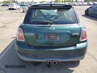 2009 MINI Hardtop S with VIN WMWMF73539TW85698, listed as a Copart auction lot 54957685 with 98,429 mi miles and Clean Title. Bid and sale history available at DreamBid. Image 6.