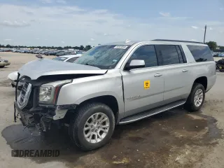 2016 GMC Yukon XL SLE with VIN 1GKS1FKC3GR130218, listed as a Copart auction lot 65323564 with 176,947 mi miles and Salvage Title. Bid and sale history available at carsss.com. Image 1.