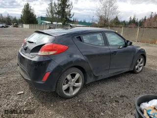2014 Hyundai Veloster with VIN KMHTC6AD1EU186166, listed as a Copart auction lot 50207375 with 102,695 mi miles and Salvage Title. Bid and sale history available at carsss.com. Image 3.