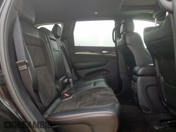2019 Jeep Grand Cherokee Trailhawk with VIN 1C4RJFLG8KC613582, listed as a Copart auction lot 62901405 with 136,809 mi miles and Salvage title. Bid and sale history available at DreamBid. Image 11.