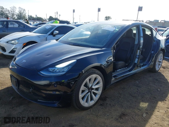 2022 Tesla Model 3 with VIN 5YJ3E1EA9NF295890, listed as a IAAI auction lot 41175917 with 42,230 mi miles and . Bid and sale history available at DreamBid. Image 24.