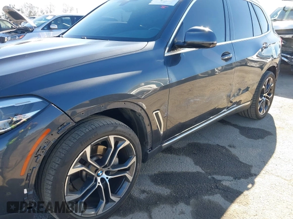 2021 BMW X5 sDrive40i with VIN 5UXCR4C08M9E15642, listed as a IAAI auction lot 41377524 with 76,050 mi miles. Bid and sale history available at carsss.com. Image 6.