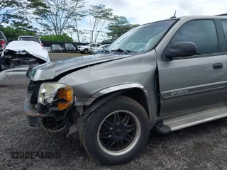 2005 GMC Envoy SLT z VIN 1GKDS13S152161472, wystawiony jako IAAI lot #40110978 z przebiegiem 141 908 mil mil oraz . Historia ofert i sprzedaży dostępna na DreamBid. Obrazek 22.