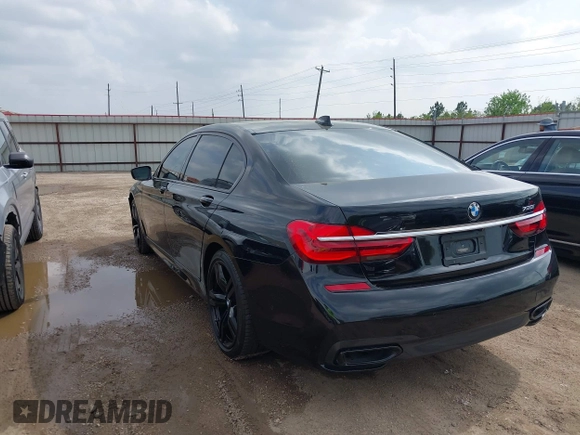 2017 BMW 7 Series 750i with VIN WBA7F0C55HGM21460, listed as a IAAI auction lot 41934198 with 58,206 mi miles and . Bid and sale history available at DreamBid. Image 3.