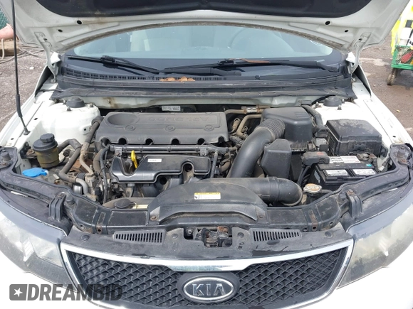 2010 Kia Forte EX z VIN KNAFU4A22A5292290, wystawiony jako IAAI lot #42195990 z przebiegiem 81 220 mil mil oraz . Historia ofert i sprzedaży dostępna na DreamBid. Obrazek 10.