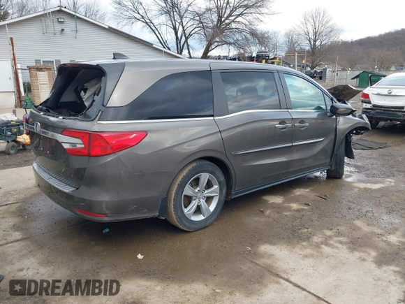 2019 Honda Odyssey EX with VIN 5FNRL6H50KB097304, listed as a IAAI auction lot 41659899 with 128,641 mi miles. Bid and sale history available at carsss.com. Image 4.