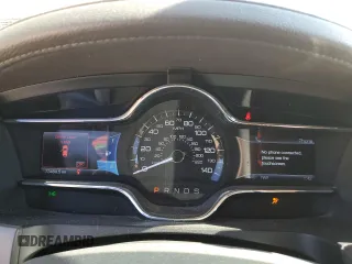 2013 Lincoln MKS z VIN 1LNHL9DK0DG605400, wystawiony jako Copart lot #77071034 z przebiegiem 73 450 mil mil oraz Szkoda całkowita • Salvage title. Historia ofert i sprzedaży dostępna na DreamBid. Obrazek 9.