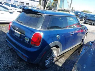 2015 MINI Cooper Hardtop S with VIN WMWXP7C51F2A41308, listed as a IAAI auction lot 41479097 with NaN miles. Bid and sale history available at carsss.com. Image 4.