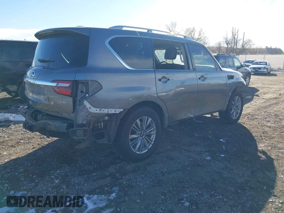 2020 Infiniti QX80 Luxe with VIN JN8AZ2NE5L9253264, listed as a IAAI auction lot 41012767 with 106,672 mi miles and . Bid and sale history available at DreamBid. Image 4.