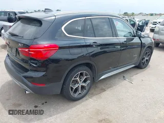 2017 BMW X1 xDrive28i with VIN WBXHT3Z34H4A53528, listed as a IAAI auction lot 42429800 with 75,986 mi miles and . Bid and sale history available at DreamBid. Image 4.