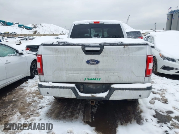 2018 Ford F-150 XL with VIN 1FTFW1E54JKC59793, listed as a IAAI auction lot 41558134 with 217,831 mi miles. Bid and sale history available at carsss.com. Image 16.
