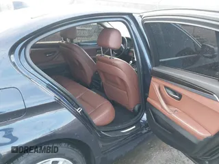 2015 BMW 5 Series 528i xDrive with VIN WBA5A7C5XFD624325, listed as a IAAI auction lot 41528322 with 111,054 mi miles and . Bid and sale history available at carsss.com. Image 8.