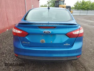 2013 Ford Focus SE z VIN 1FADP3F21DL310739, wystawiony jako Copart lot #57679325 z przebiegiem 225 860 mil mil oraz Czysty tytuł • Clean title. Historia ofert i sprzedaży dostępna na DreamBid. Obrazek 6.