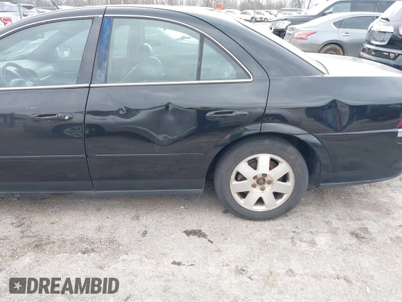 2002 Lincoln LS w/Base Pkg with VIN 1LNHM86S82Y701044, listed as a IAAI auction lot 41592614 with 192,902 mi miles. Bid and sale history available at carsss.com. Image 6.