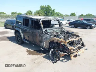 2021 Jeep Wrangler Unlimited Sahara z VIN 1C4JJXP60MW643293, wystawiony jako IAAI lot #42276393 z przebiegiem Nie podano mil oraz . Historia ofert i sprzedaży dostępna na DreamBid. Obrazek 1.