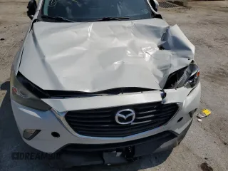 2017 Mazda CX-3 Touring z VIN JM1DKDC75H0168823, wystawiony jako Copart lot #57968955 z przebiegiem 116 231 mil mil oraz Szkoda całkowita • Salvage title. Historia ofert i sprzedaży dostępna na DreamBid. Obrazek 12.