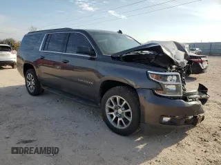 2017 Chevrolet Suburban LT with VIN 1GNSKHKC2HR135066, listed as a Copart auction lot 50545315 with 95,601 mi miles and Salvage Title. Bid and sale history available at carsss.com. Image 4.