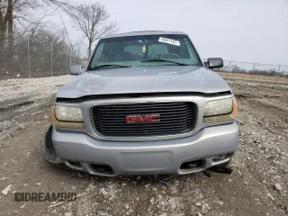 1999 GMC Denali with VIN 1GKEK13R0XR915053, listed as a Copart auction lot 49241145 with 2,664,121 mi miles and Salvage Title. Bid and sale history available at carsss.com. Image 5.