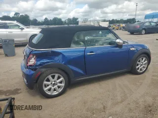 2015 MINI Convertible S with VIN WMWZP3C59F2A91231, listed as a Copart auction lot 59296415 with 31,642 mi miles and Salvage title. Bid and sale history available at DreamBid. Image 3.