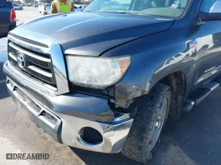 2013 Toyota Tundra 4WD Truck with VIN 5TFUW5F16DX307070, listed as a IAAI auction lot 41306027 with 258,219 mi miles. Bid and sale history available at carsss.com. Image 6.