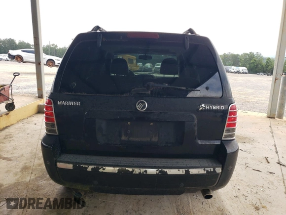 2007 Mercury Mariner with VIN 4M2CU39H97KJ03132, listed as a Copart auction lot 61134654 with 263,005 mi miles and Salvage title. Bid and sale history available at DreamBid. Image 6.