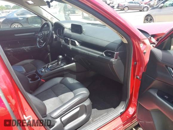 2019 Mazda CX-5 Touring with VIN JM3KFACM6K1549234, listed as a IAAI auction lot 42036633 with 85,065 mi miles and . Bid and sale history available at carsss.com. Image 5.
