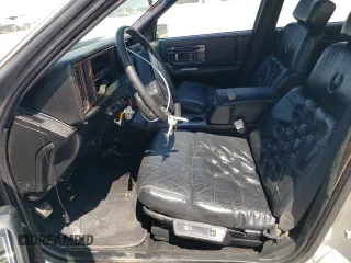 1991 Cadillac Seville z VIN 1G6KS53B9MU824142, wystawiony jako Copart lot #74276264 z przebiegiem 103 517 mil mil oraz Szkody całkowita. Historia ofert i sprzedaży dostępna na DreamBid. Obrazek 7.