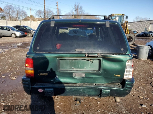 1997 Jeep Grand Cherokee Limited with VIN 1J4GZ78Y2VC728605, listed as a Copart auction lot 83342804 with 104,185 mi miles and Salvage Title. Bid and sale history available at carsss.com. Image 6.
