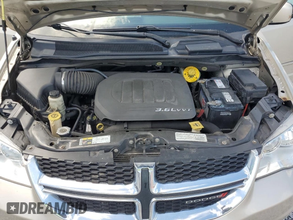 2014 Dodge Grand Caravan SXT z VIN 2C4RDGCG8ER266814, wystawiony jako Copart lot #52053155 z przebiegiem 279 551 mil mil oraz Tytuł czysty. Historia ofert i sprzedaży dostępna na DreamBid. Obrazek 12.