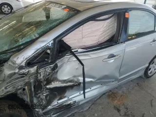 2006 Honda Civic LX with VIN 1HGFA16506L065908, listed as a Copart auction lot 51797795 with 87,456 mi miles and Salvage Title. Bid and sale history available at DreamBid. Image 7.