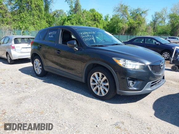 2013 Mazda CX-5 Grand Touring with VIN JM3KE4DE6D0127601, listed as a IAAI auction lot 42143558 with 95,719 mi miles and . Bid and sale history available at DreamBid. Image 1.