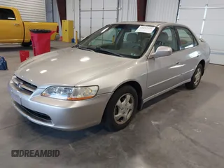 1999 Honda Accord EX z VIN JHMCG5651XC030706, wystawiony jako IAAI lot #42437226 z przebiegiem 185 310 mil mil oraz . Historia ofert i sprzedaży dostępna na DreamBid. Obrazek 2.