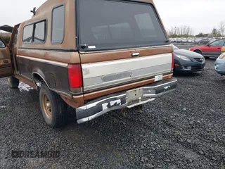 1990 Ford F-150 with VIN 2FTEF14Y1LCA00886, listed as a IAAI auction lot 41774272 with 17,872 mi miles. Bid and sale history available at carsss.com. Image 6.