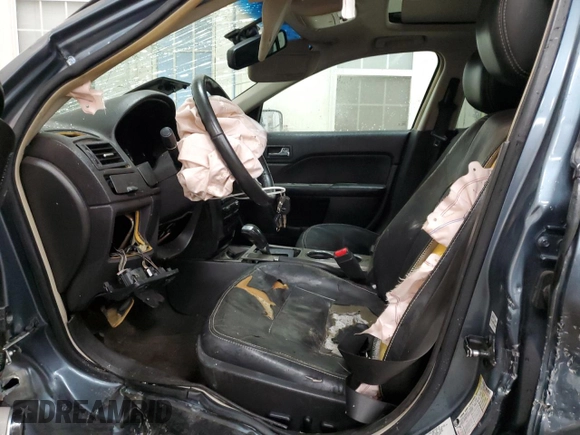 2012 Ford Fusion SEL with VIN 3FAHP0JA1CR270077, listed as a Copart auction lot 69078734 with 154,263 mi miles and Clean Title. Bid and sale history available at DreamBid. Image 7.