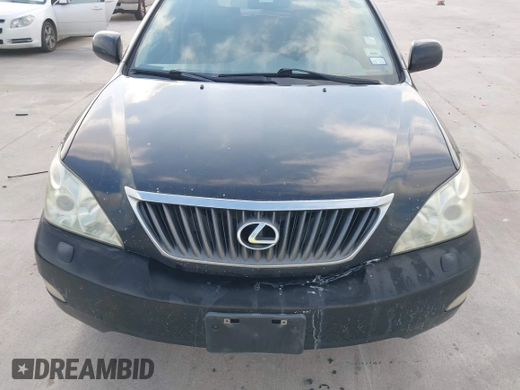 2008 Lexus RX with VIN 2T2HK31U38C064322, listed as a IAAI auction lot 42074366 with 241,459 mi miles. Bid and sale history available at carsss.com. Image 12.