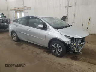 2017 Toyota Prius Plus z VIN JTDKARFP9H3034575, wystawiony jako Copart lot #57501125 z przebiegiem 82 647 mil mil oraz Szkoda całkowita • Salvage title. Historia ofert i sprzedaży dostępna na DreamBid. Obrazek 4.