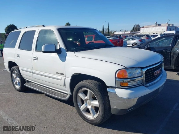 2004 GMC Yukon SLT with VIN 1GKEC13T64R289853, listed as a IAAI auction lot 41668408 with 163,829 mi miles. Bid and sale history available at carsss.com. Image 1.