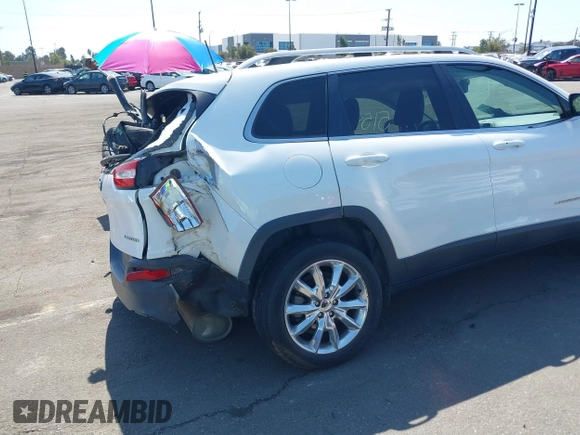 2016 Jeep Cherokee High Altitude with VIN 1C4PJLDB0GW249558, listed as a IAAI auction lot 41851549 with 128,638 mi miles. Bid and sale history available at carsss.com. Image 6.