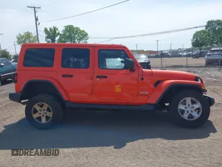 2019 Jeep Wrangler Unlimited Sahara with VIN 1C4HJXEGXKW579982, listed as a IAAI auction lot 42167111 with 98,243 mi miles and . Bid and sale history available at DreamBid. Image 14.