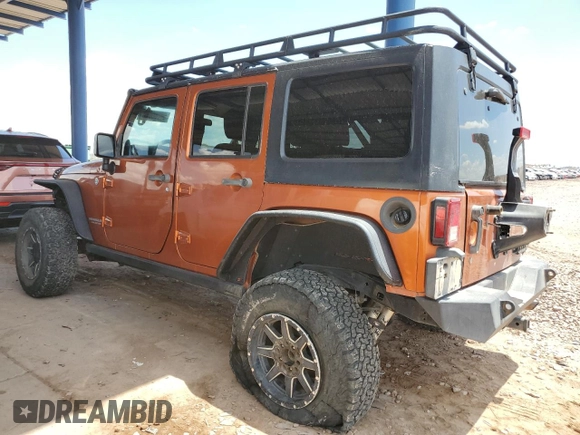 2011 Jeep Wrangler Unlimited Rubicon with VIN 1J4BA6H13BL538385, listed as a Copart auction lot 64080075 with 90,459 mi miles and Salvage title. Bid and sale history available at DreamBid. Image 2.