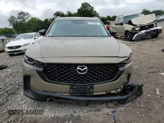 2023 Mazda CX-50 Premium Plus with VIN 7MMVABEY6PN113039, listed as a Copart auction lot 61629645 with 55,759 mi miles and Salvage title. Bid and sale history available at DreamBid. Image 5.