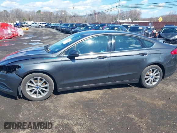 2017 Ford Fusion SE with VIN 3FA6P0H75HR401388, listed as a IAAI auction lot 41868407 with 147,102 mi miles and . Bid and sale history available at DreamBid. Image 14.