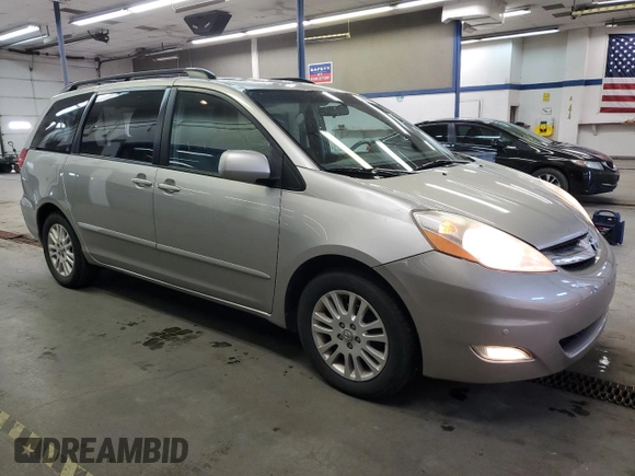 2010 Toyota Sienna XLE with VIN 5TDYK4CC0AS309461, listed as a Copart auction lot 51869275 with 156,598 mi miles and Salvage Title. Bid and sale history available at carsss.com. Image 4.