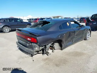 2013 Dodge Charger RT Max with VIN 2C3CDXCT4DH580262, listed as a IAAI auction lot 41252672 with 103,276 mi miles. Bid and sale history available at carsss.com. Image 4.