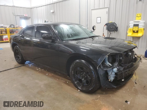 2010 Dodge Charger Police with VIN 2B3AA4CTXAH228620, listed as a Copart auction lot 84744964 with 158,440 mi miles and Clean Title. Bid and sale history available at DreamBid. Image 4.